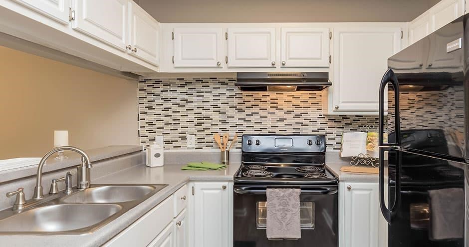 Kitchen With Black Appliances Kitchen With Black Appliances at Westbury Creek, Augusta, GA