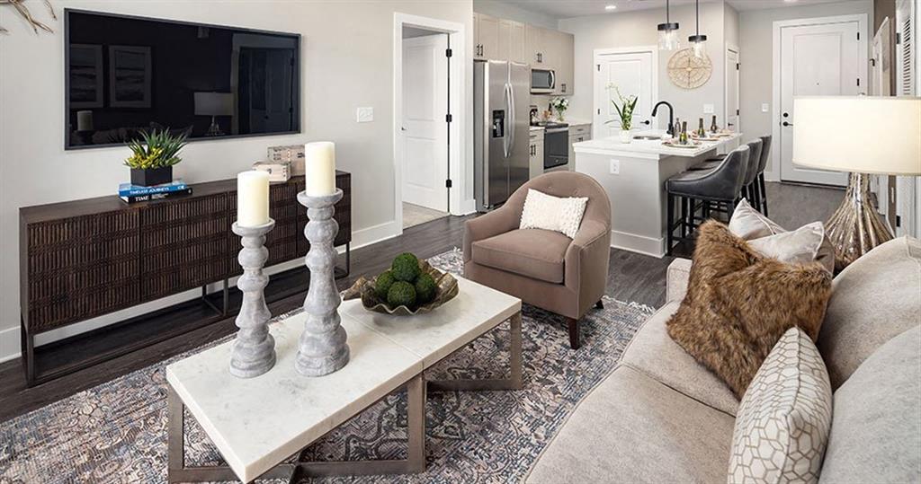 a living room with a couch and a table