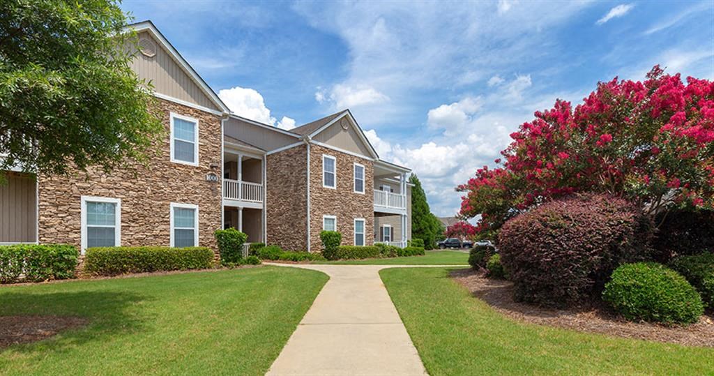 a sidewalk in front of an apartment building at Bedford Parke Apartments, Georgia, 31088