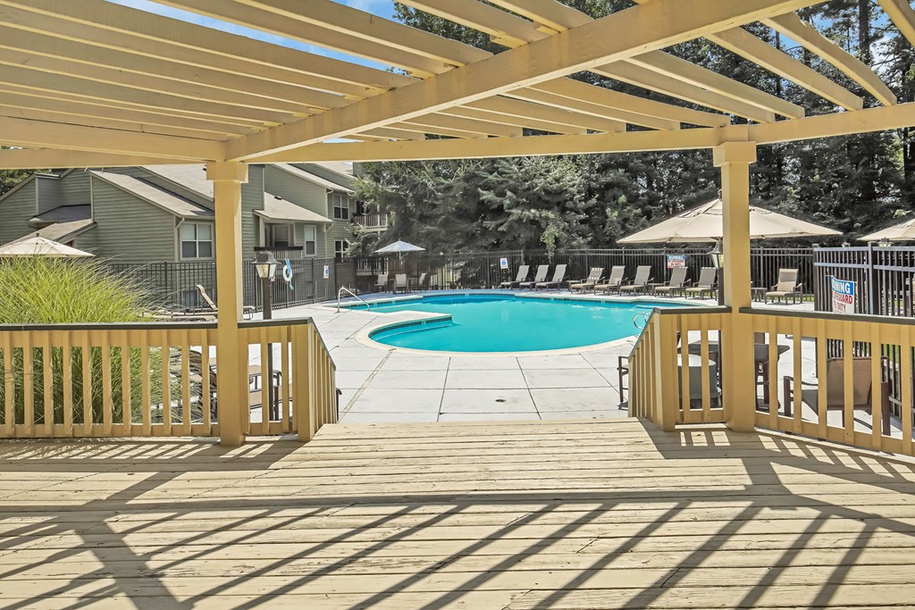 take a dip in the pool under the pergola at Hunters Chase Apartments, Midlothian, VA, 23112