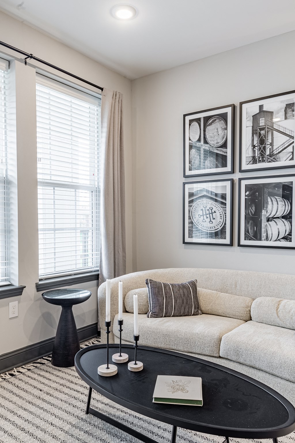 a living room with a couch and a coffee table at The Louis Apartment Flats, Kentucky