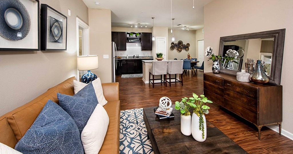 a living room with a couch and a table at Integra Vista Apartments, Hixson, Tennessee
