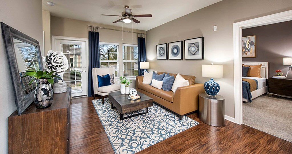 a living room with a couch and a table
