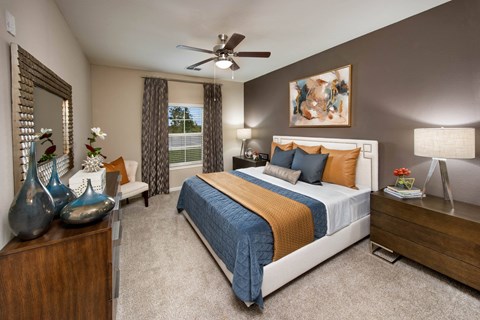 a bedroom with a bed and a ceiling fan at Integra Vista Apartments, Hixson, 37343