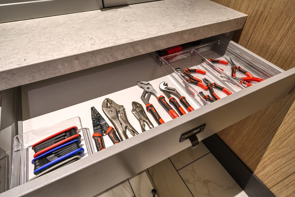 a drawer with a bunch of tools in it at Lyric at Norton Commons Apartments, Prospect, Kentucky, 40059