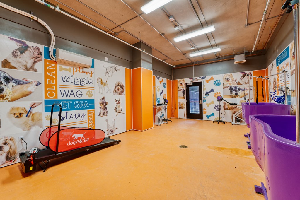 a large room with a large wall mural and a skateboard on the floor at Lyric at Norton Commons Apartments, Prospect, Kentucky, 40059