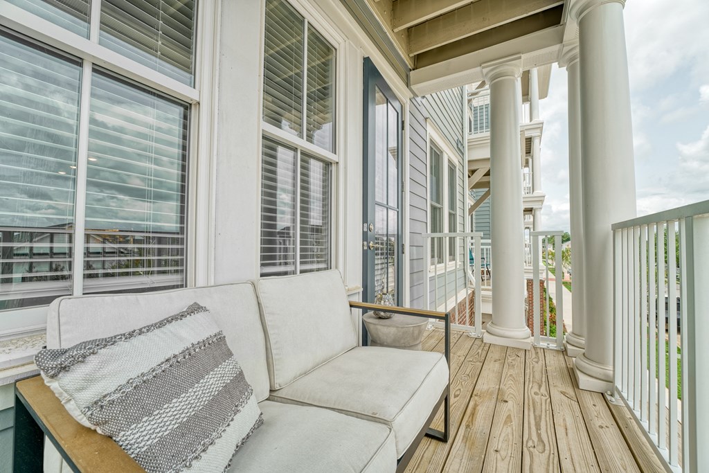 a porch with a couch and many windows at Lyric at Norton Commons Apartments, Prospect, KY, 40059