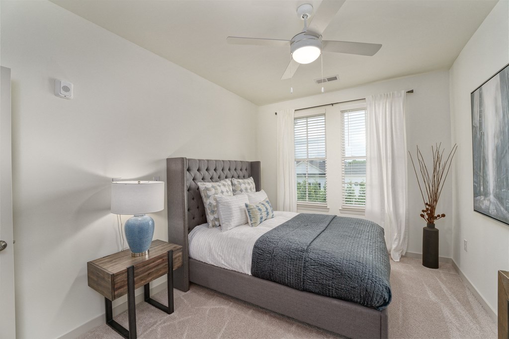 a bedroom with a bed and a ceiling fan at Lyric at Norton Commons Apartments, Prospect, 40059