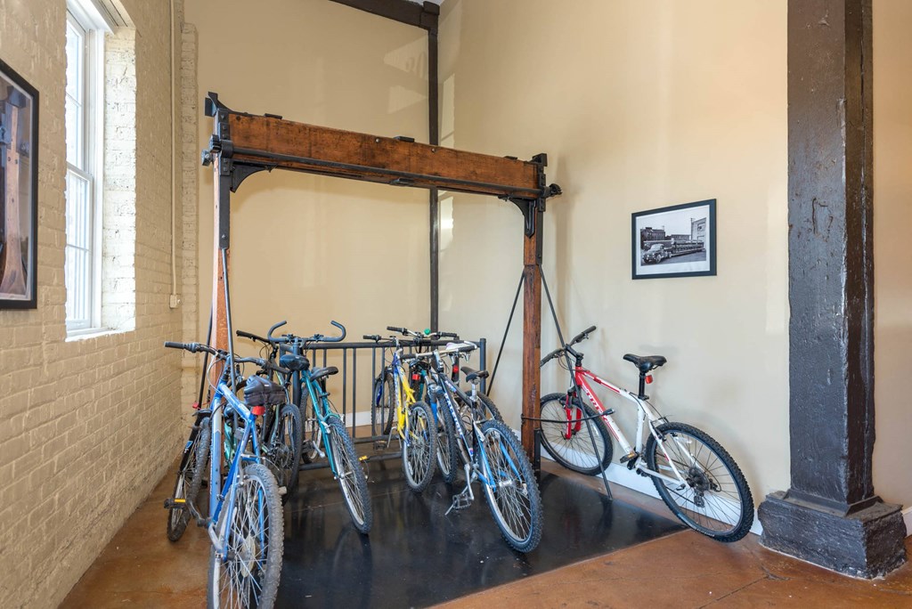 a group of bikes parked in a room at Mayton Transfer Lofts, Petersburg, VA 23803