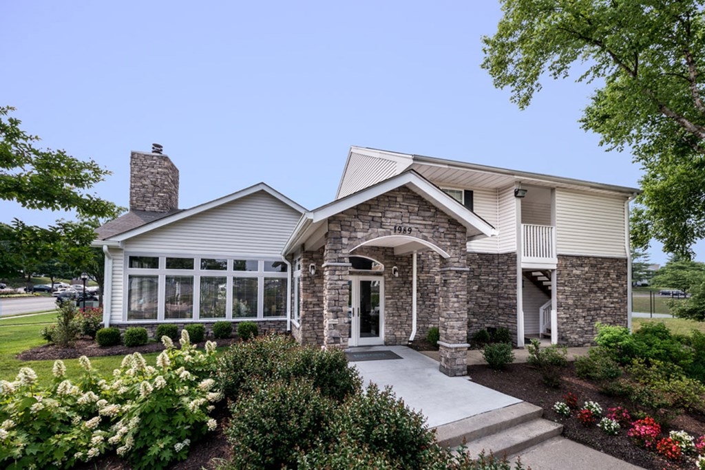 the front of a home with a stone and siding exterior the front of a home with a stone and siding exterior at Misty Ridge Apartments, Virginia, 22191