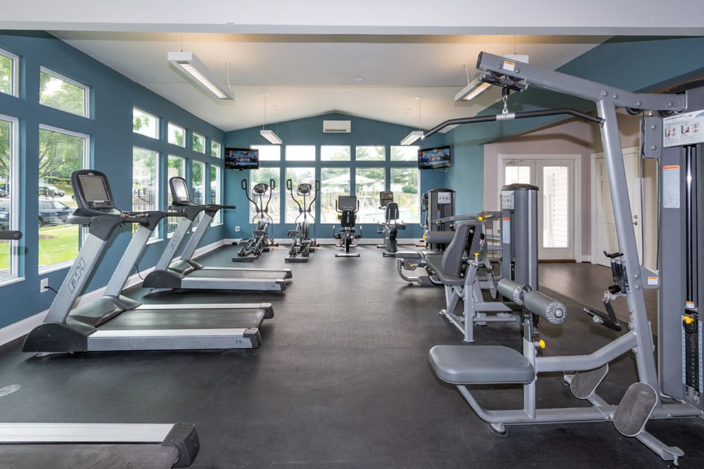 a room filled with lots of different types of exercise equipment at Misty Ridge Apartments, Woodbridge, VA 22191