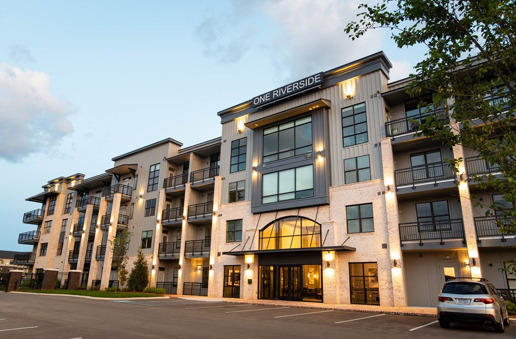 a car parked in front of an apartment building  at One Riverside Apartments, Tennessee, 37403
