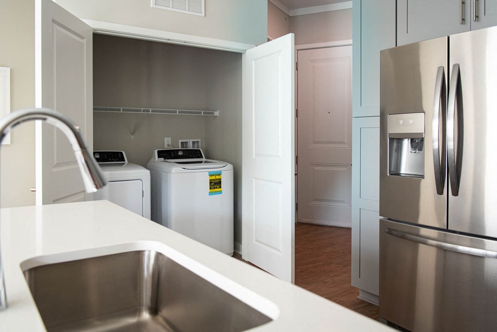 a kitchen with stainless steel appliances and a sink at One Riverside Apartments, Chattanooga, TN, 37403