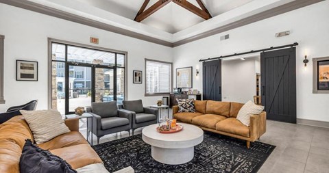 a living room with two couches and a coffee table