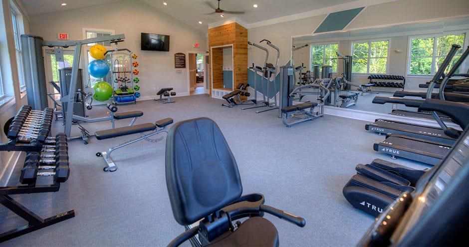 a gym with a lot of machines and chairs in it  at Lullwater at Big Ridge, Tennessee, 37343