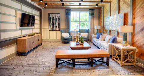 a living room with a couch and a table