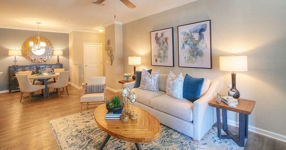 a living room with a couch and a table  at Lullwater at Big Ridge, Hixson, TN, 37343