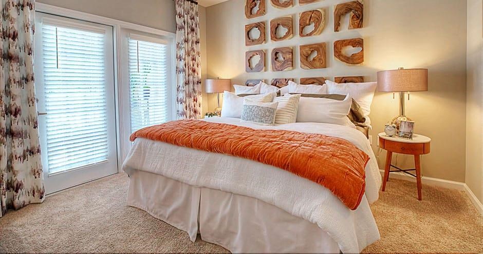 a bedroom with a bed and a large window a bedroom with a bed and a large window at Lullwater at Big Ridge, Tennessee, 37343