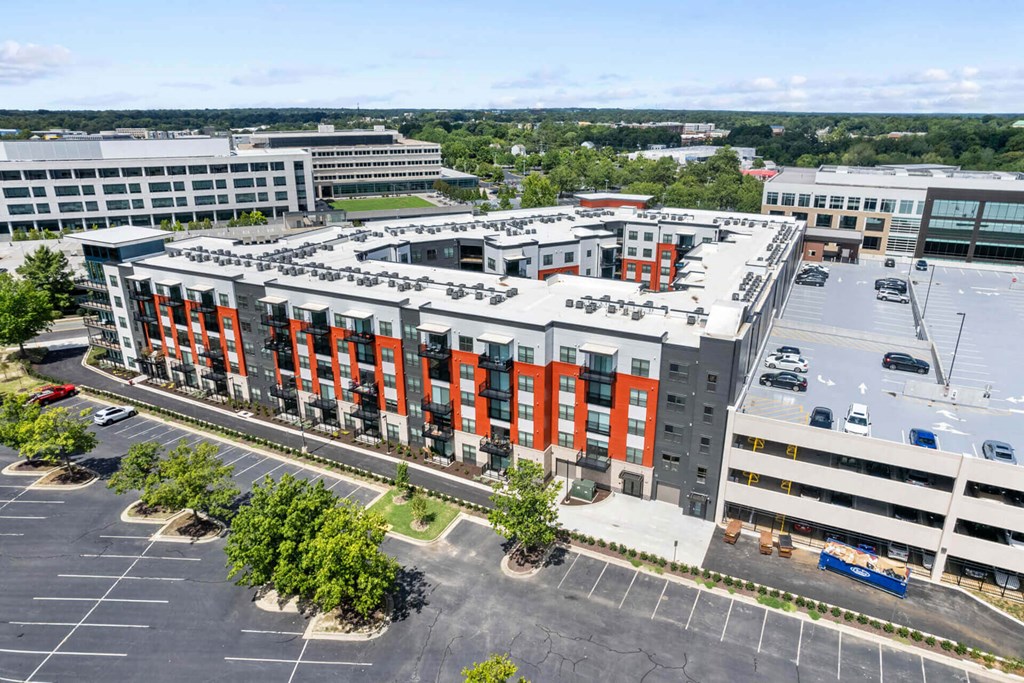 an aerial view of a large building with orange doors at Tapestry West, Richmond, 23230