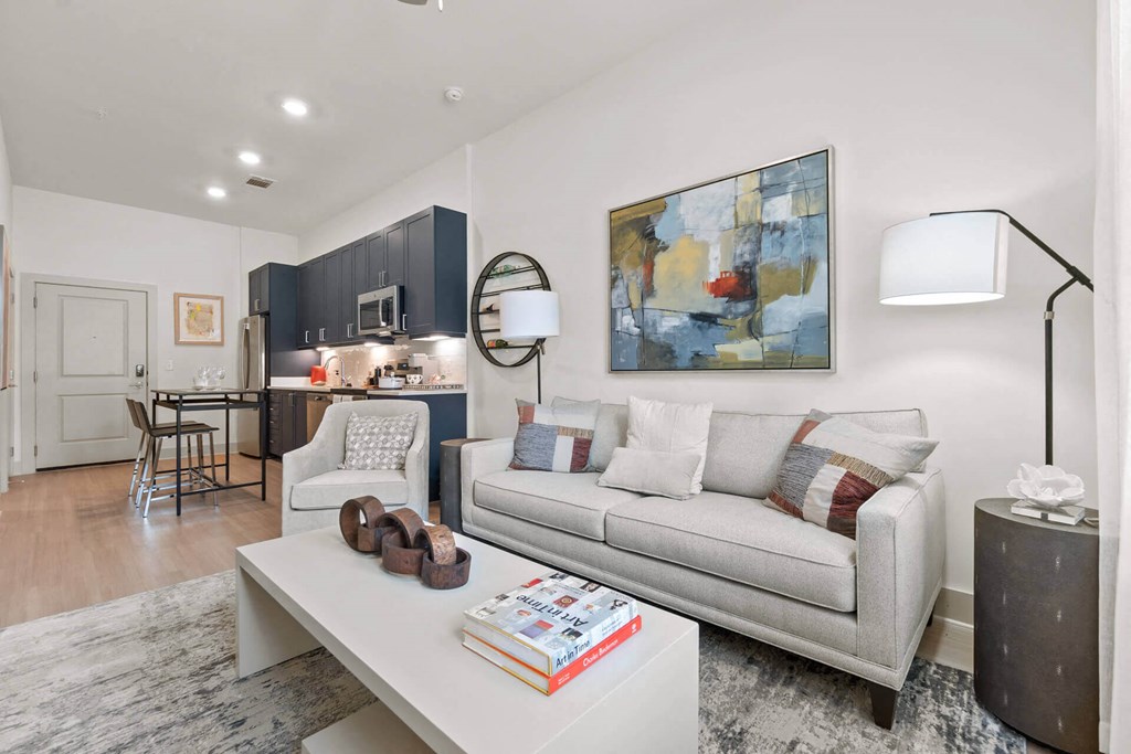 our apartments offer a living room with a couch and a coffee table at Tapestry West, VA 23230