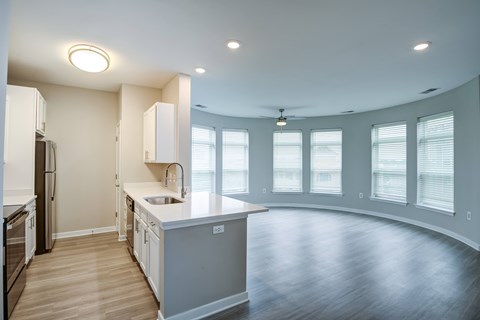 A kitchen with a large island in the middle of the room.