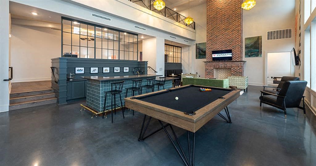 a pool table is in the middle of a room at Livingston Flats Apartments, Chesterfield, VA