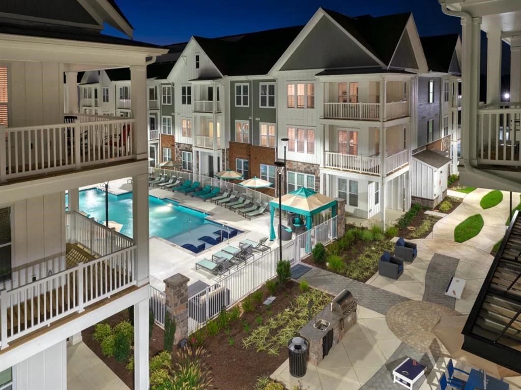 an aerial view of an apartment complex with a pool at Artistry at Winterfield Apartments, Virginia