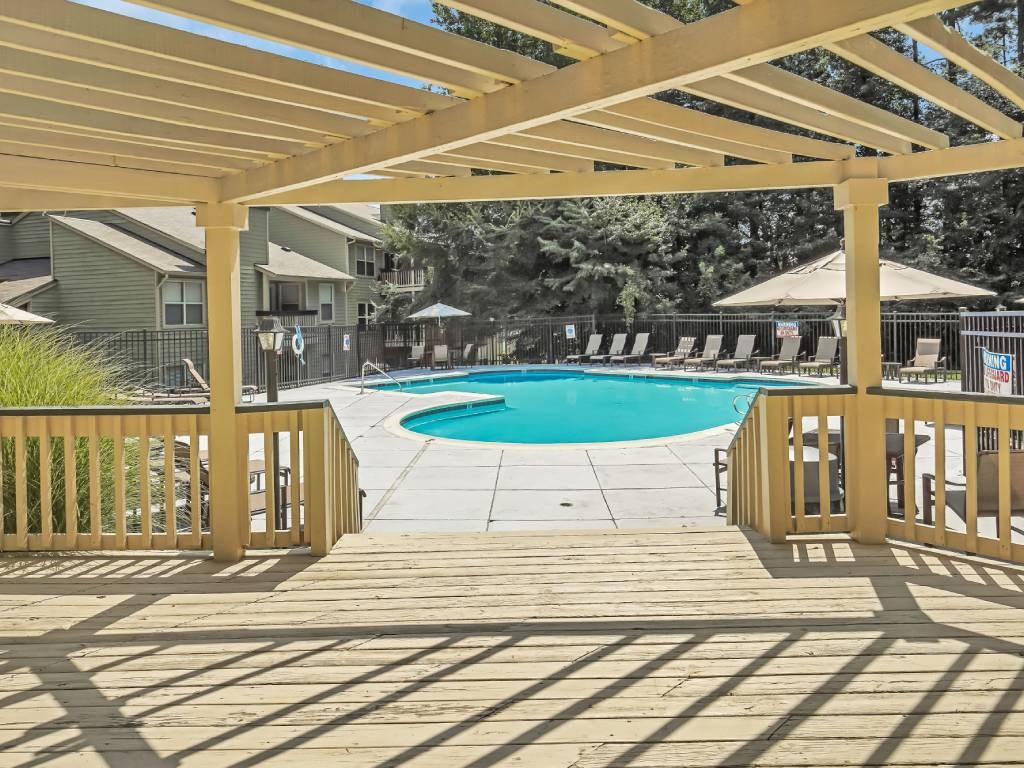 take a dip in the pool under the pergola at Hunters Chase Apartments, Midlothian, VA, 23112