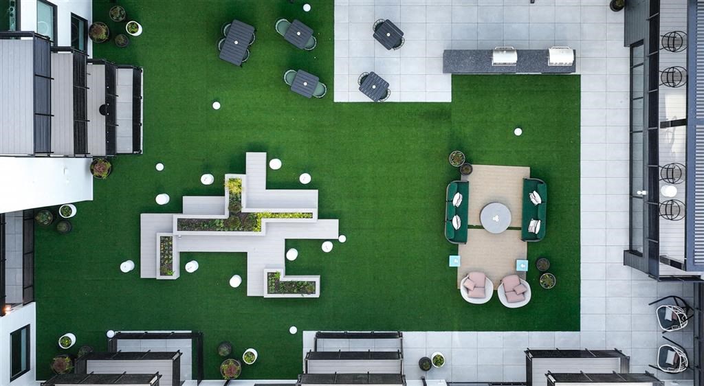 a floor plan of a building with a green lawn