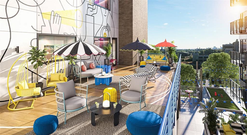 a group of chairs sitting on top of a wooden floor
