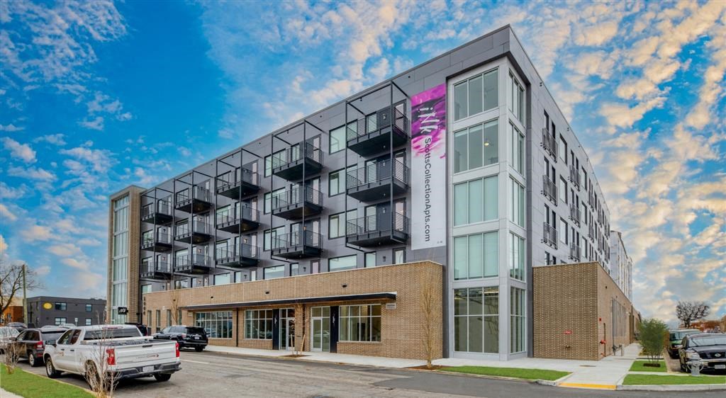 a large building with a sign on the side of it