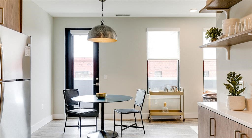 a kitchen or kitchenette at uptown city loft