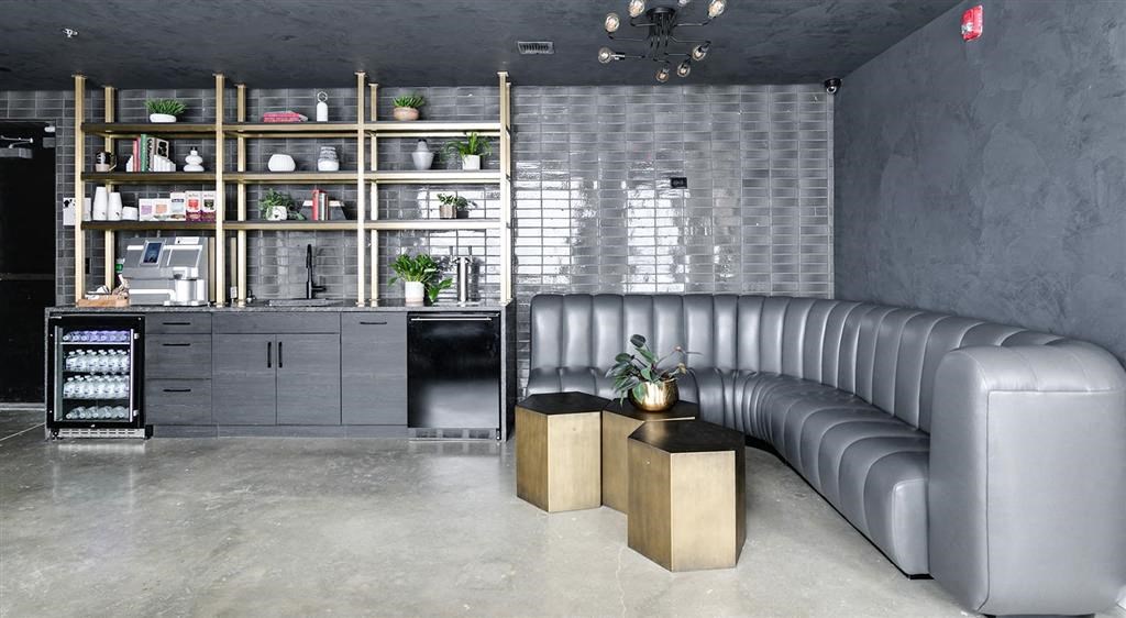 a living room with a couch and a table