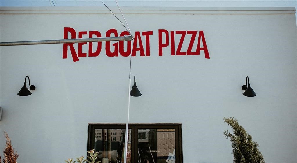 a sign that is on the side of a building