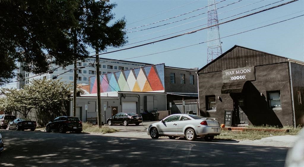 a car parked in front of a building