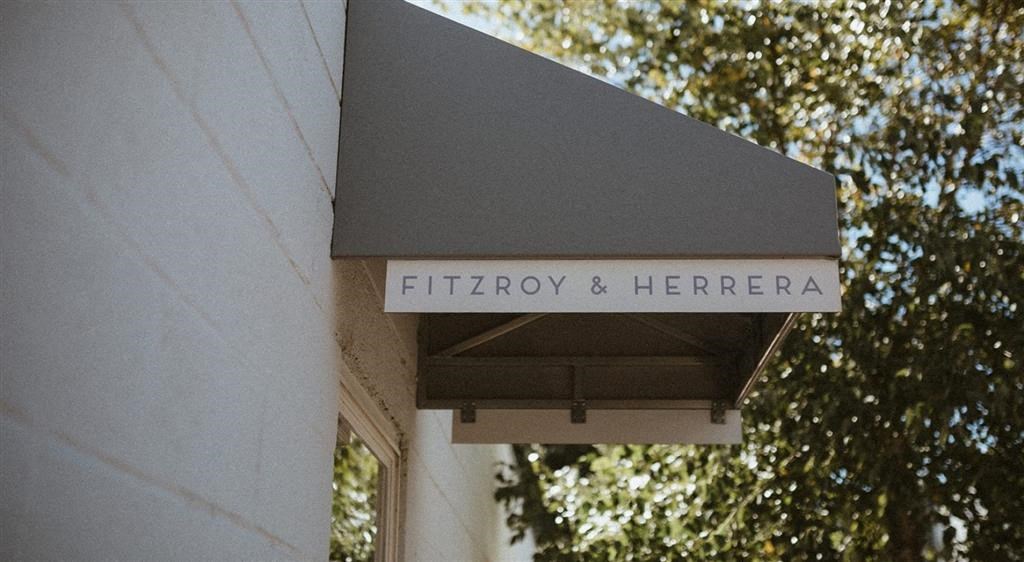 awning on a building with a tree in the background