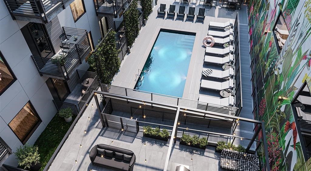 an overhead view of a swimming pool in the middle of a building