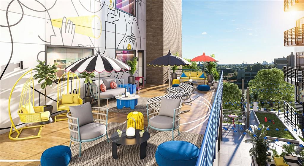 a group of chairs sitting on top of a wooden floor