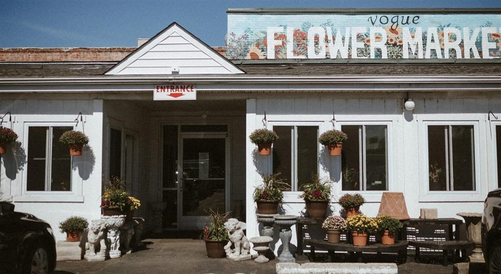 a white building with a sign on the front of it