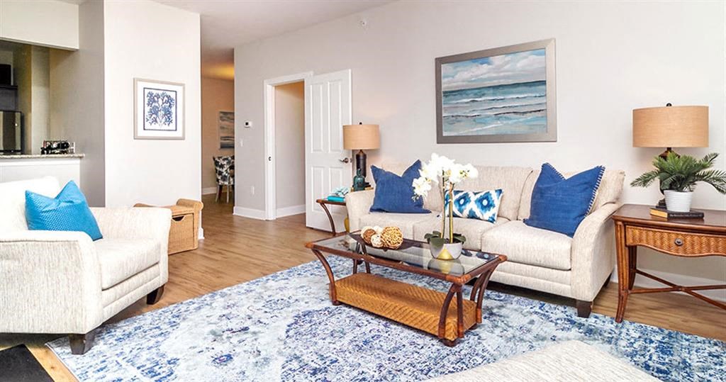 a living room with two couches and a coffee table  at Saltmeadow Bay, Virginia, 23451