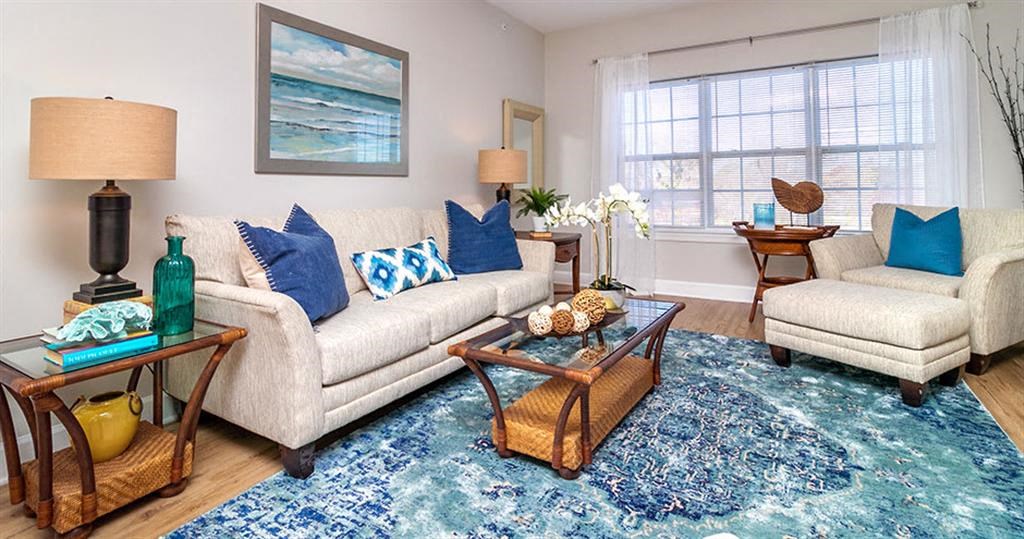 a living room with two couches and a coffee table  at Saltmeadow Bay, Virginia Beach, 23451