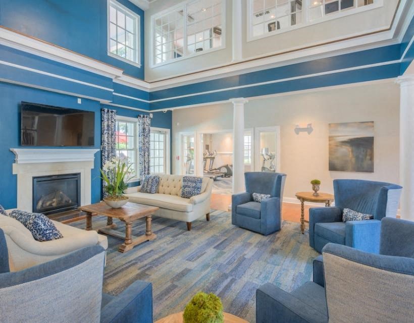 a living room filled with furniture and a fire place at Sterling Manor, Williamsburg, 23185