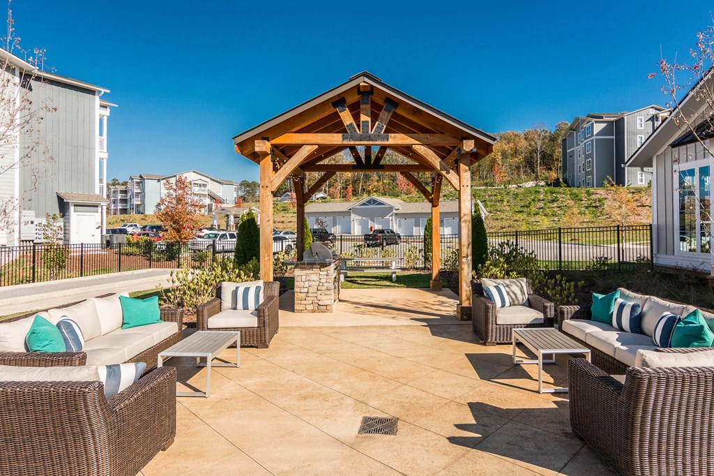 the outdoor patio of a home with chairs and a gazebo the outdoor patio of a home with chairs and a gazebo at Village at Westland Cove Apartments, Knoxville, 37922