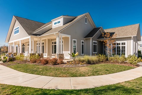 a large house with a sidewalk in front of it at Village at Westland Cove Apartments, Knoxville, TN, 37922