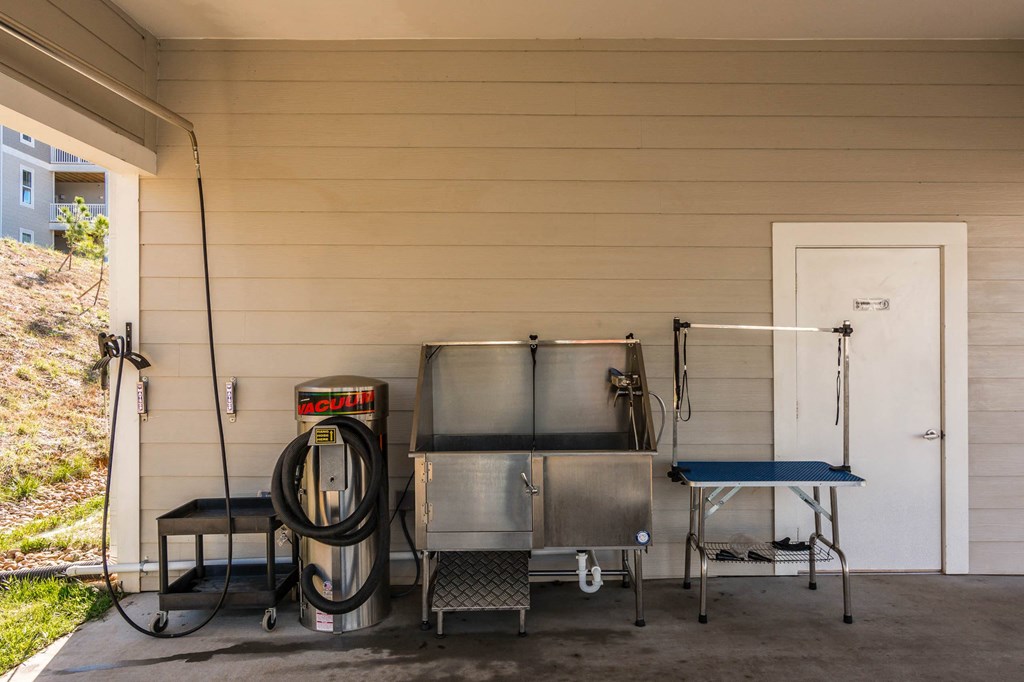 the outside of a house with two stainless steel tanks and a gas hose at Village at Westland Cove Apartments, Tennessee, 37922