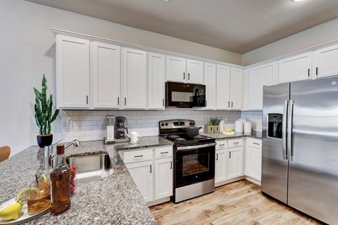 Kitchen with Stainless Steel Appliances at Brighton Townhomes in Acworth, Georgia