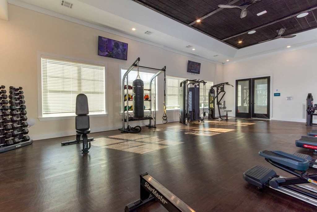 the home gym has plenty of equipment and space for workouts at Capstone at Banks Crossing, Commerce, GA