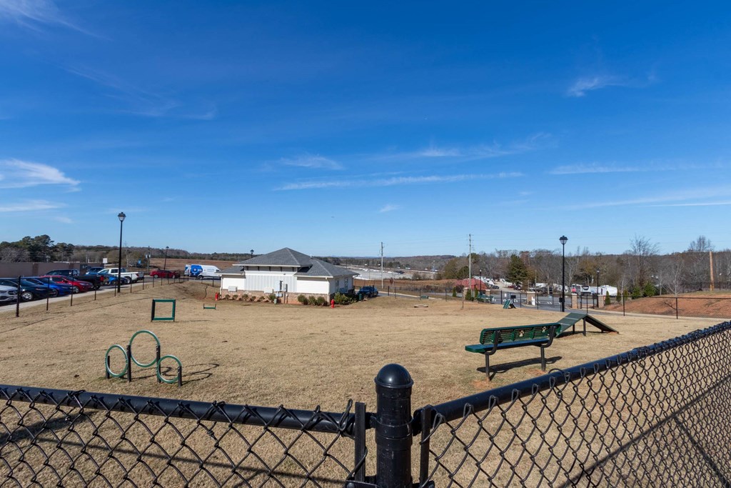 a dog park with agility equipment at Capstone at Banks Crossing, Commerce, Georgia