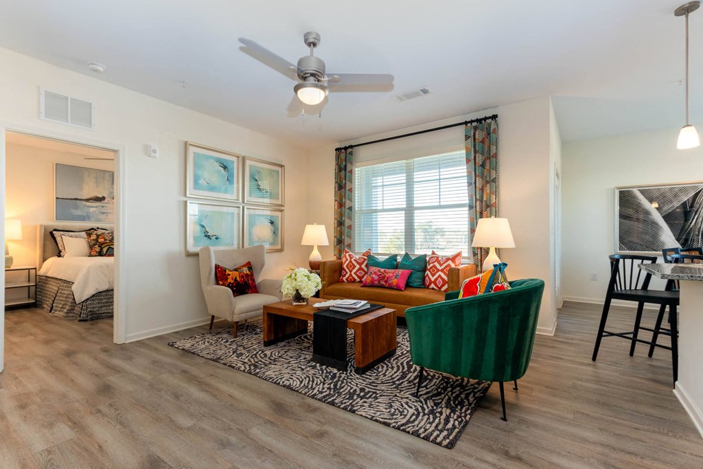 a living room with a couch at Capstone at Banks Crossing, Commerce, 30529