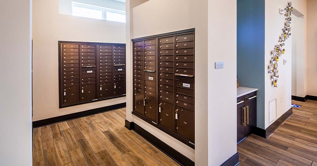 a view of the mailboxes and counter in the post office at the residences at omni at Canopy at Ginter Park Apartments, Richmond, VA, 23227